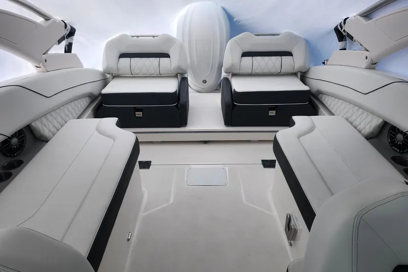 Slide: The Image of Luxurious interior of 2026 Regal LX6 boat with plush seating and modern design. - 22