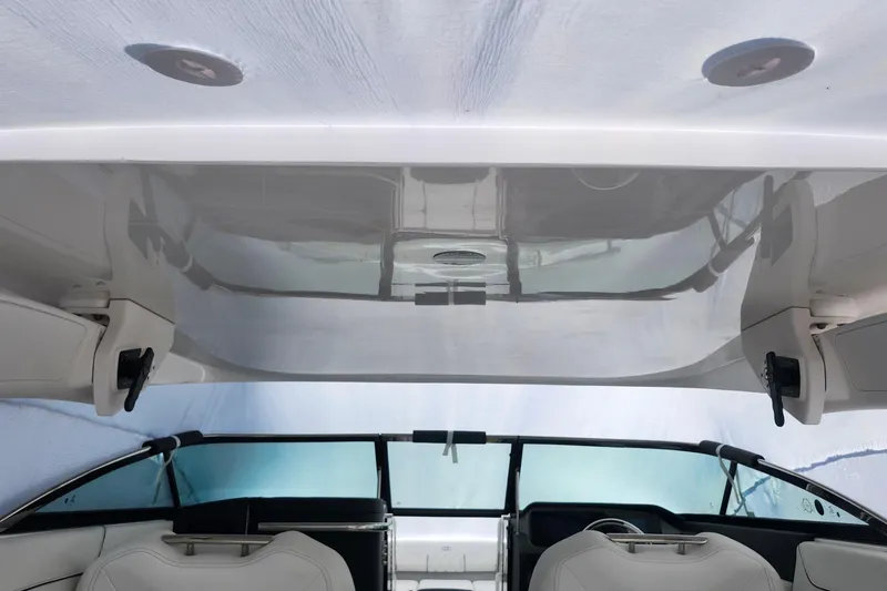 Slide: The Image of Interior view of 2026 Regal LX6 boat, showcasing sleek design and modern features. - 28