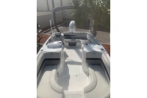 Slide: The Image of 2023 Hurricane SunDeck Sport 188 OB boat with spacious seating and sleek design. - 6