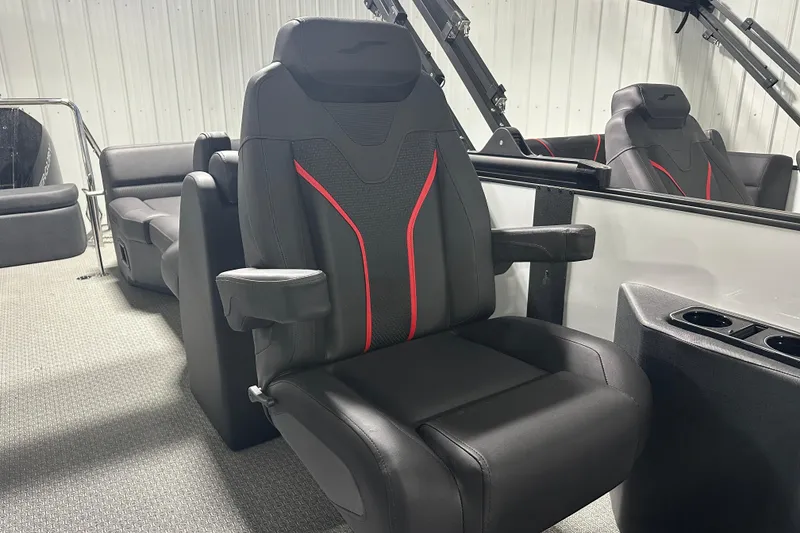 Slide: The Image of Interior of 2026 Evotti 725 QL boat with modern seating and steering console. - 10