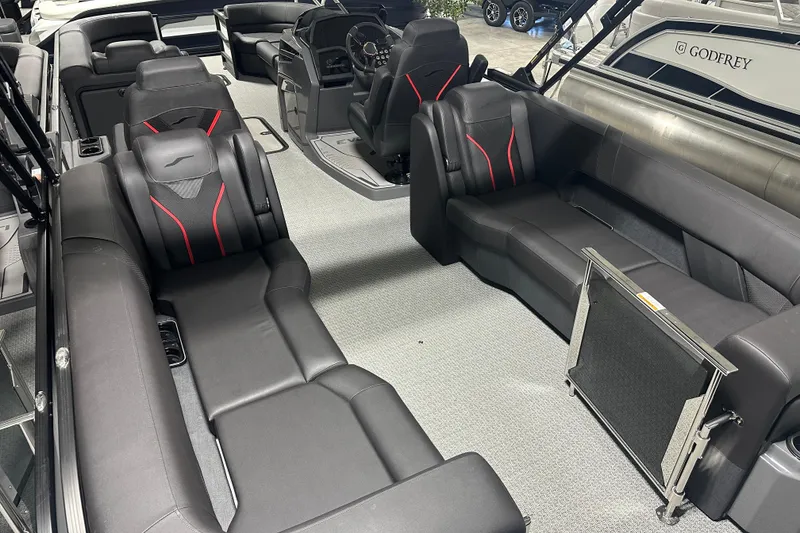 Slide: The Image of Evotti 725 QL 2026 interior detail with control panel and logo. - 13