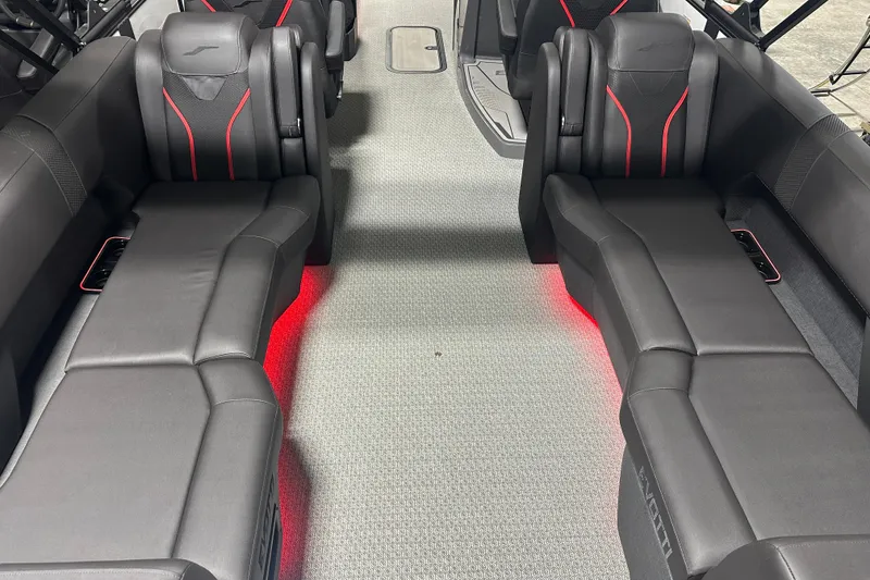 Slide: The Image of Steering console of 2026 Evotti 725 QL boat with modern controls and display. - 16