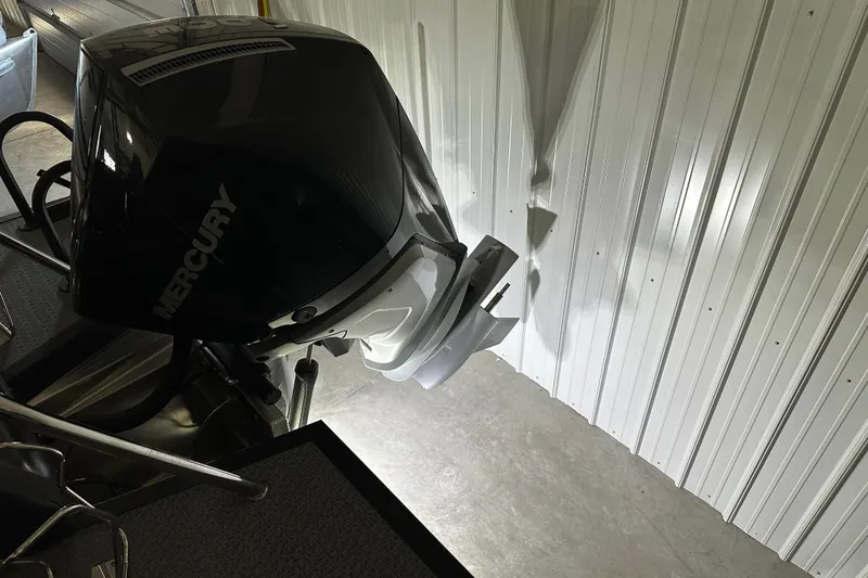 Slide: The Image of Illuminated cup holders in 2026 Evotti 725 QL interior, featuring sleek design and red lighting. - 22