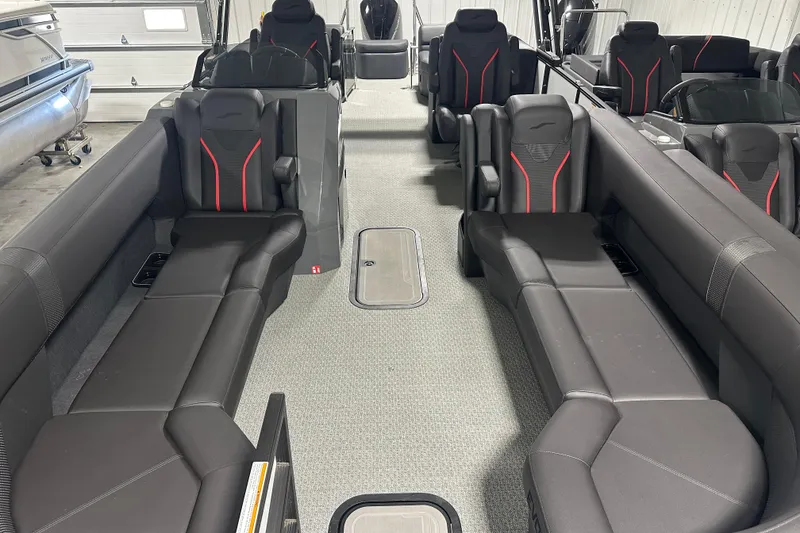 Slide: The Image of 2026 Evotti 725 QL boat in showroom, featuring sleek design and modern detailing. - 8