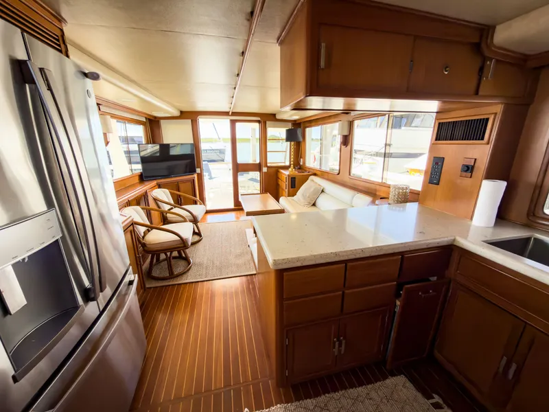 Slide: The Image of Interior of a 1996 Fleming 55 yacht with modern kitchen. - 6