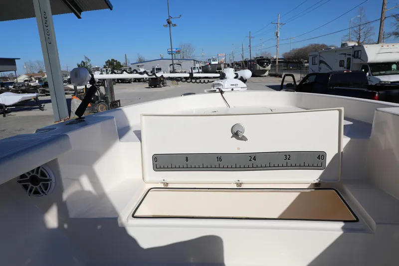 Slide: The Image of 2023 Pathfinder 2700 Open boat interior with measuring scale and storage compartment. - 10