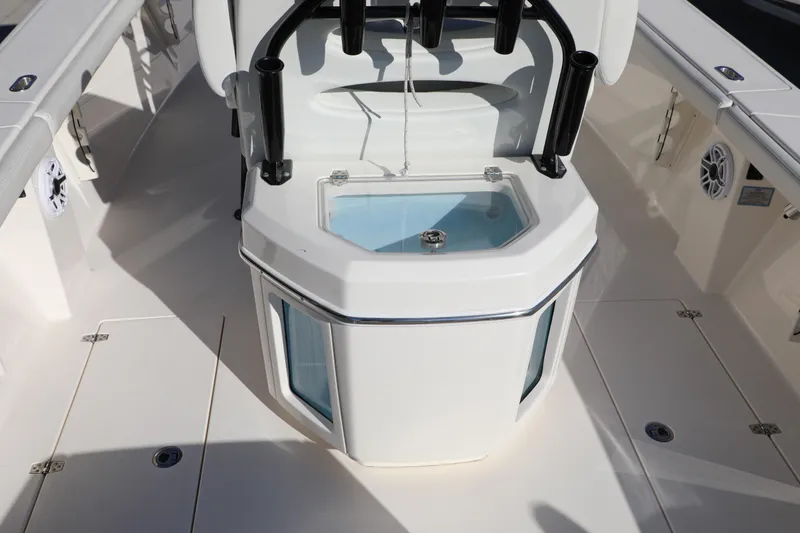 Slide: The Image of 2023 Pathfinder 2700 Open boat interior with livewell and rod holders. - 14