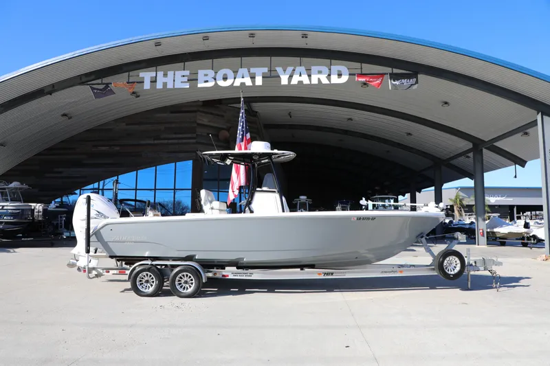 Slide: The Image of 2023 Pathfinder 2700 Open boat on trailer at The Boat Yard dealership. - 2