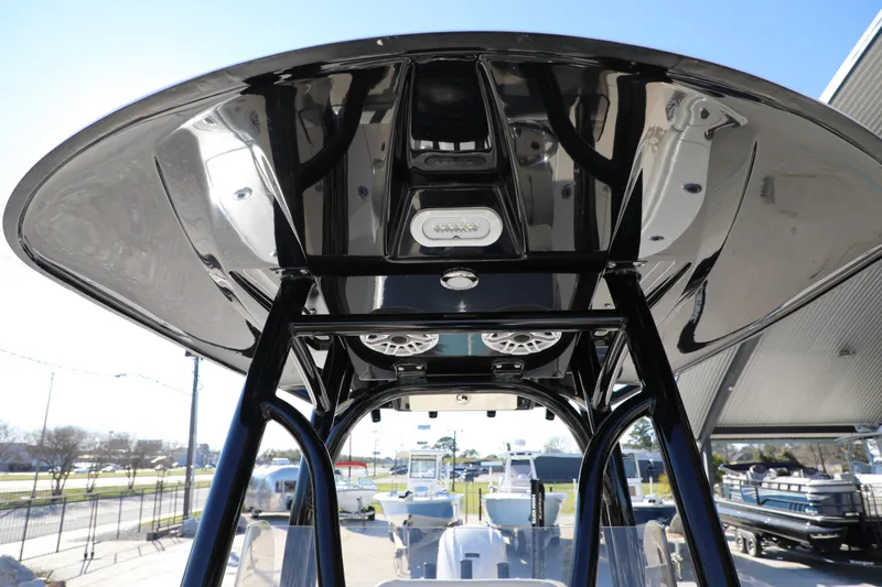Slide: The Image of 2023 Pathfinder 2700 Open boat T-top with integrated speakers and lighting. - 5