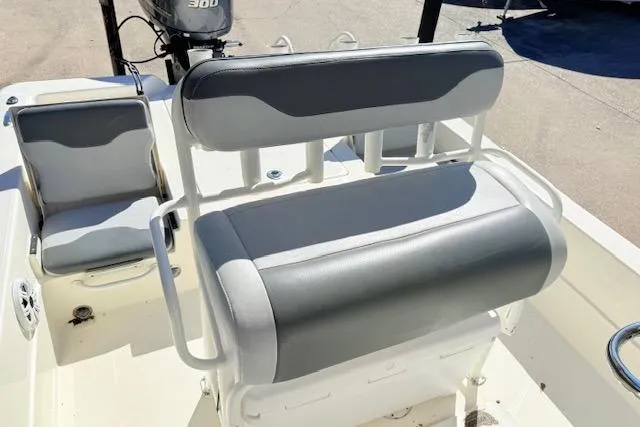 Slide: The Image of 2017 Skeeter SX240 boat interior with gray and white seating. - 6