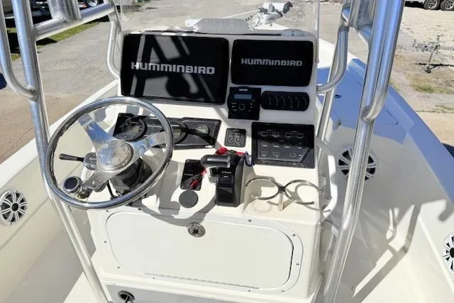 Slide: The Image of 2017 Skeeter SX240 boat console with dual Humminbird displays and steering wheel. - 7