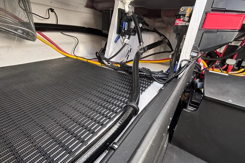 Slide: The Image of Interior view of 2026 Monterey Elite 30 OB boat wiring and components. - 21