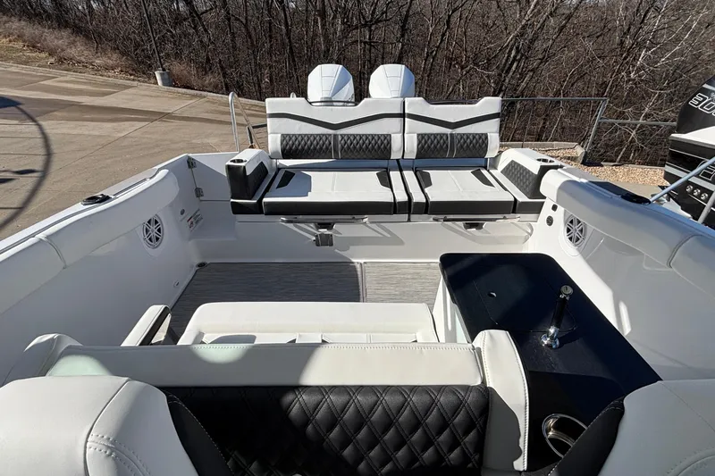 Slide: The Image of 2026 Monterey Elite 30 OB boat interior with luxurious seating and modern design. - 27