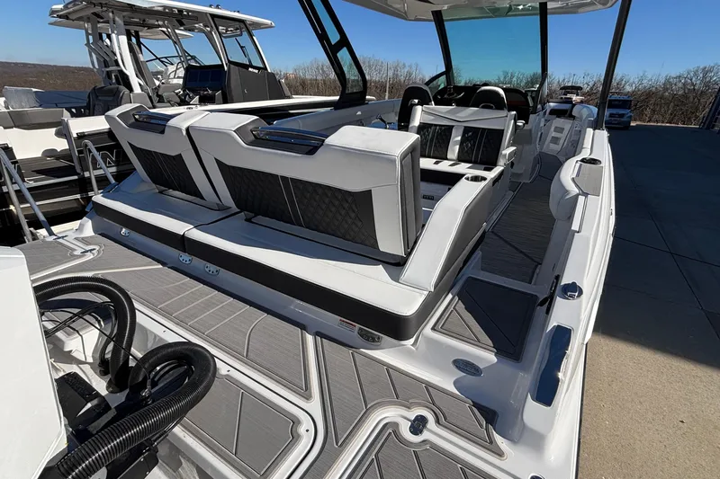 Slide: The Image of 2026 Monterey Elite 30 OB boat interior with luxurious seating and modern design. - 3