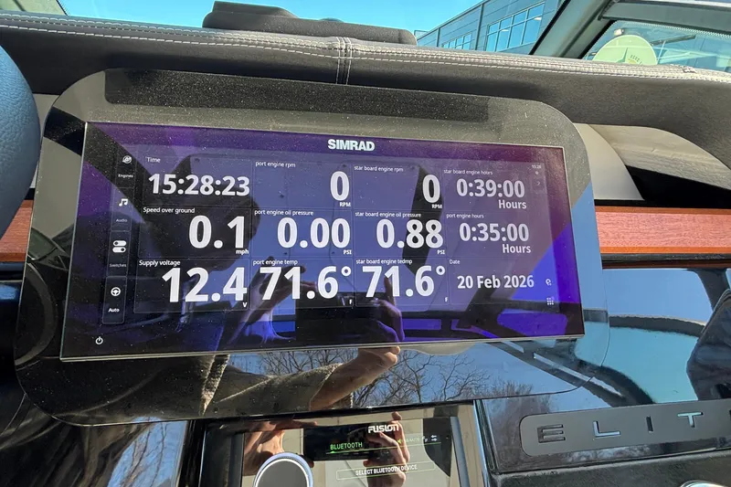 Slide: The Image of Dashboard of 2026 Monterey Elite 30 OB boat displaying engine data and date. - 34