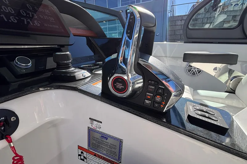 Slide: The Image of 2026 Monterey Elite 30 OB boat control panel with advanced throttle system. - 37