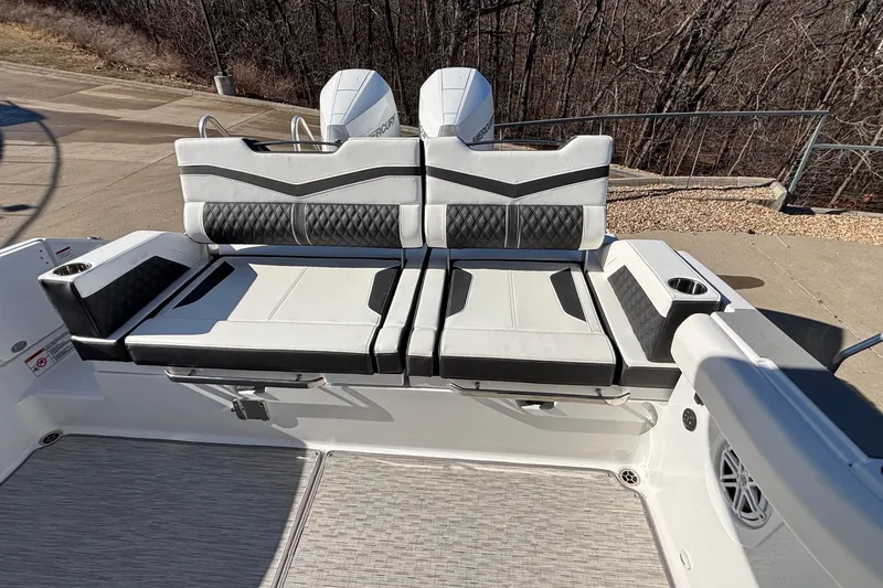Slide: The Image of 2026 Monterey Elite 30 OB boat interior with stylish seating and modern design. - 7