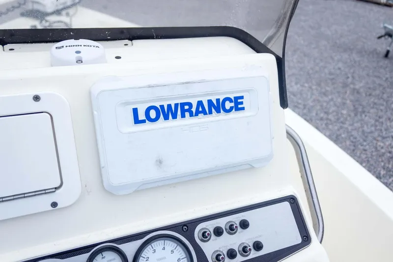 Slide: The Image of 2013 Skeeter SX210 boat dashboard with Lowrance GPS and Minn Kota equipment. - 27