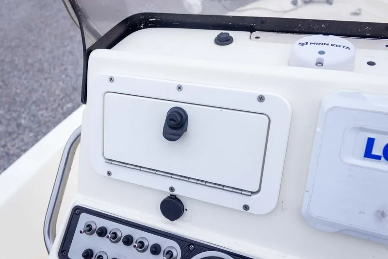 Slide: The Image of Control panel of a 2013 Skeeter SX210 boat with Minn Kota accessory. - 28