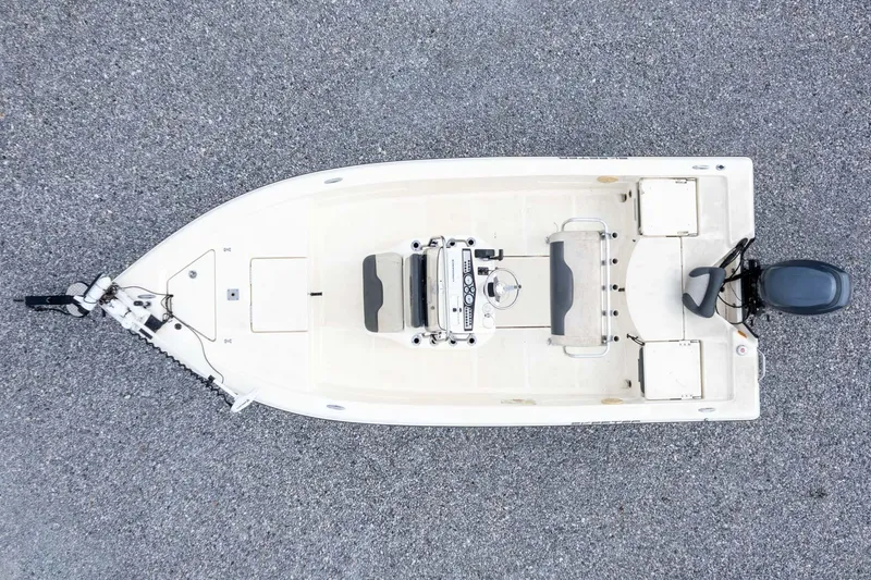 Slide: The Image of Overhead view of 2013 Skeeter SX210 boat on gravel surface. - 32