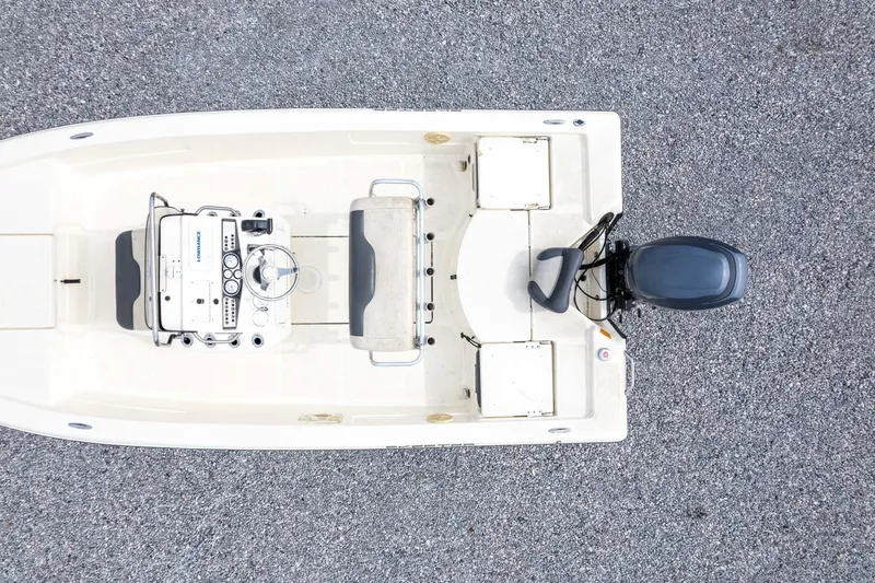 Slide: The Image of Overhead view of 2013 Skeeter SX210 boat on gravel surface. - 34
