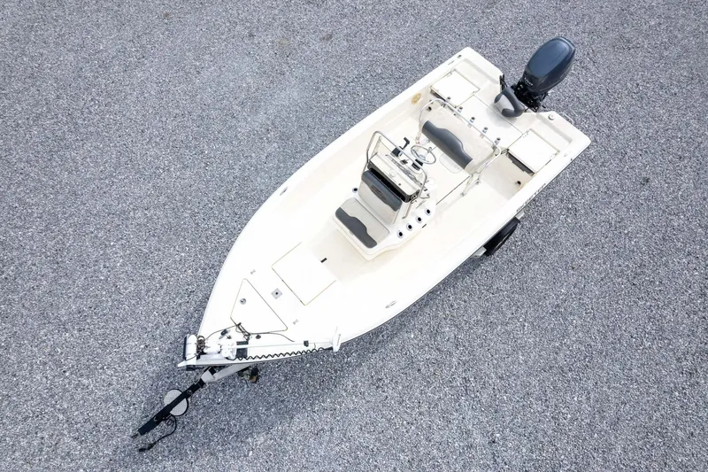 Slide: The Image of Overhead view of a 2013 Skeeter SX210 boat on a gravel surface. - 35