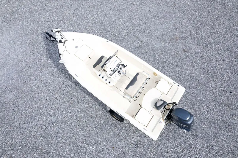 Slide: The Image of Overhead view of a 2013 Skeeter SX210 boat on a gravel surface. - 37