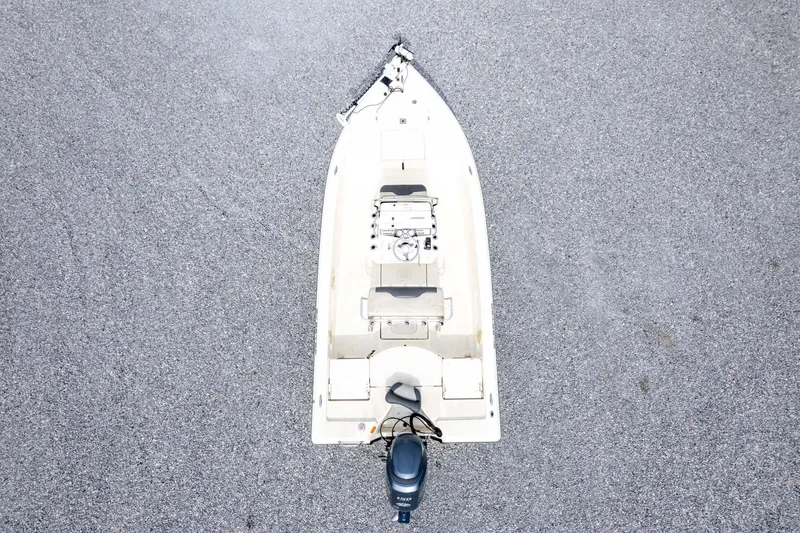 Slide: The Image of Aerial view of 2013 Skeeter SX210 boat on textured surface. - 38