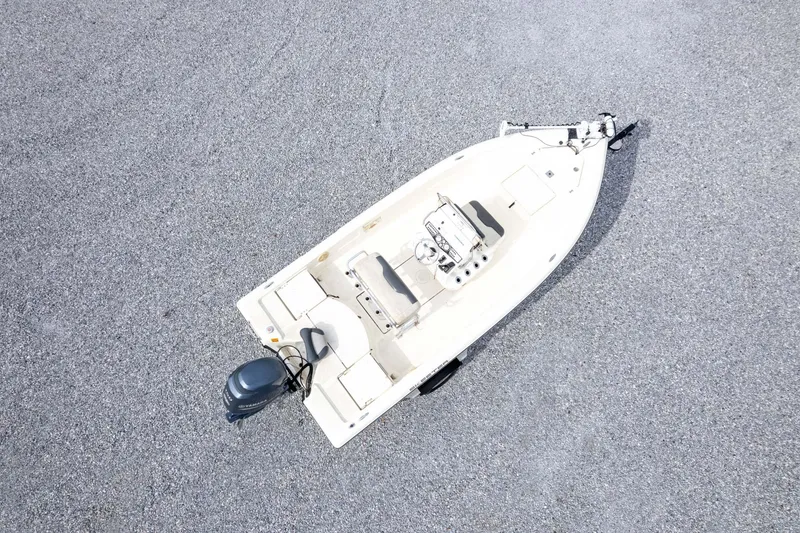 Slide: The Image of Aerial view of 2013 Skeeter SX210 boat on gravel surface. - 39