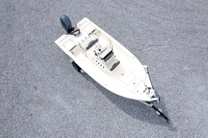 Slide: The Image of 2013 Skeeter SX210 boat on trailer, aerial view on gravel surface. - 41