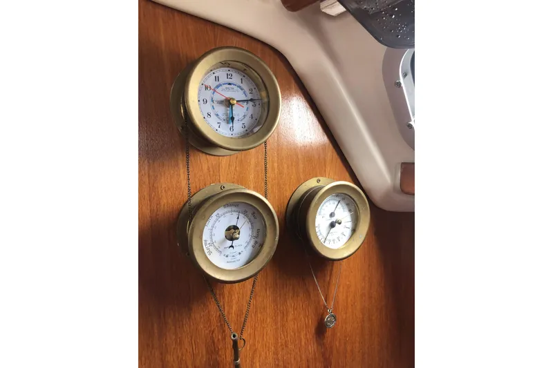 Slide: The Image of Brass nautical instruments on Catalina 320 yacht, 1998 model, mounted on wooden panel. - 25