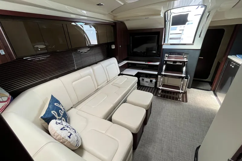 Slide: The Image of Luxurious interior of 2015 Monterey 415 Sport Yacht with plush seating and modern amenities. - 19