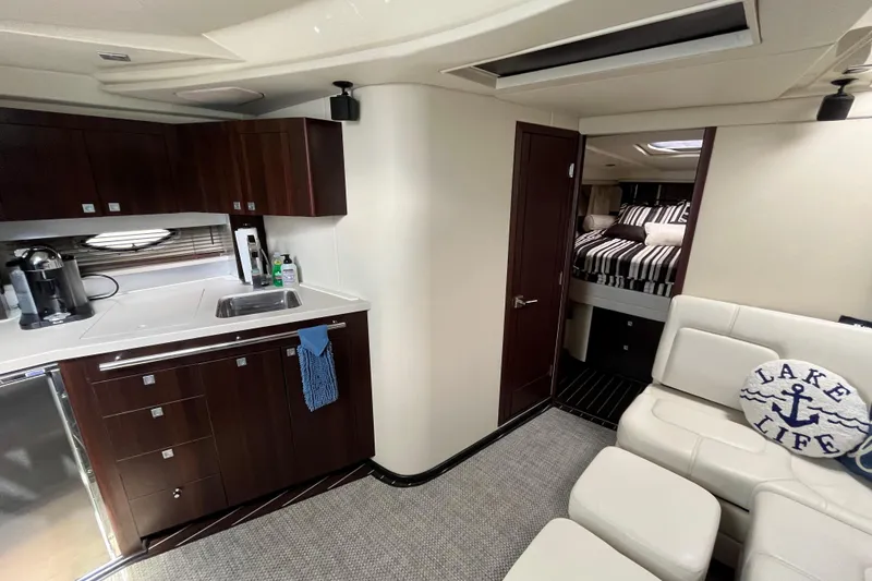 Slide: The Image of Luxurious interior of 2015 Monterey 415 Sport Yacht with kitchen and cozy bedroom. - 20