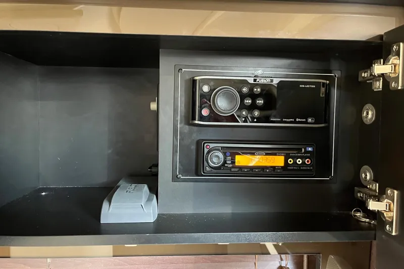 Slide: The Image of Audio system in 2015 Monterey 415 Sport Yacht, featuring Fusion and Jensen components. - 29