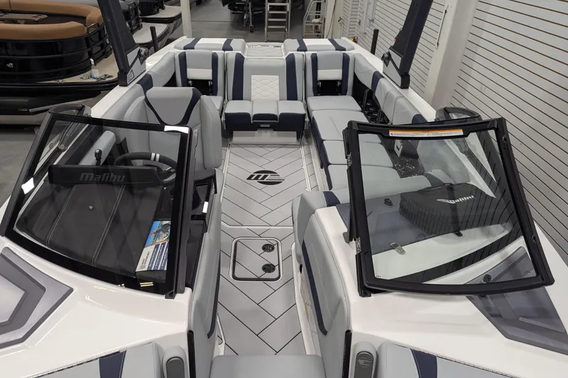 Slide: The Image of 2026 Malibu Wakesetter 23 LSV interior with sleek seating and modern design. - 18