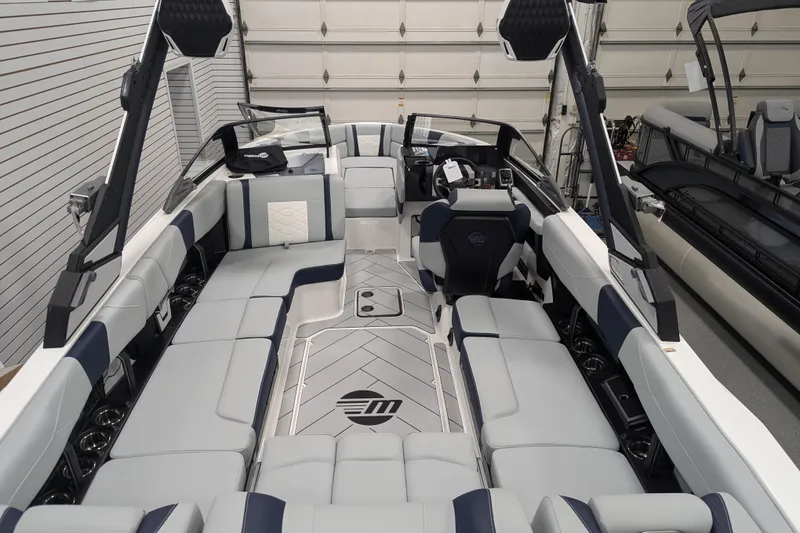 Slide: The Image of 2026 Malibu Wakesetter 23 LSV interior, featuring luxurious seating and modern design. - 20