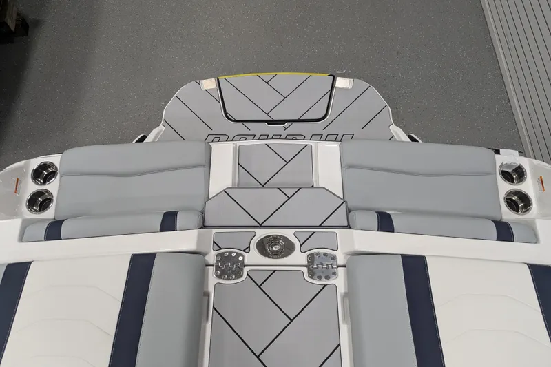Slide: The Image of 2026 Malibu Wakesetter 23 LSV boat interior with gray and blue seating. - 21