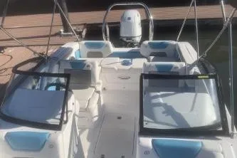 Slide: The Image of 2025 Hurricane SunDeck 2050 OB boat with spacious seating and modern design. - 10