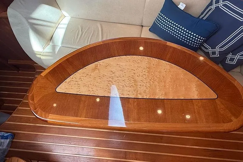 Slide: The Image of Luxurious interior of 2008 Tiara Yachts 3900 Sovran with elegant wooden table. - 15