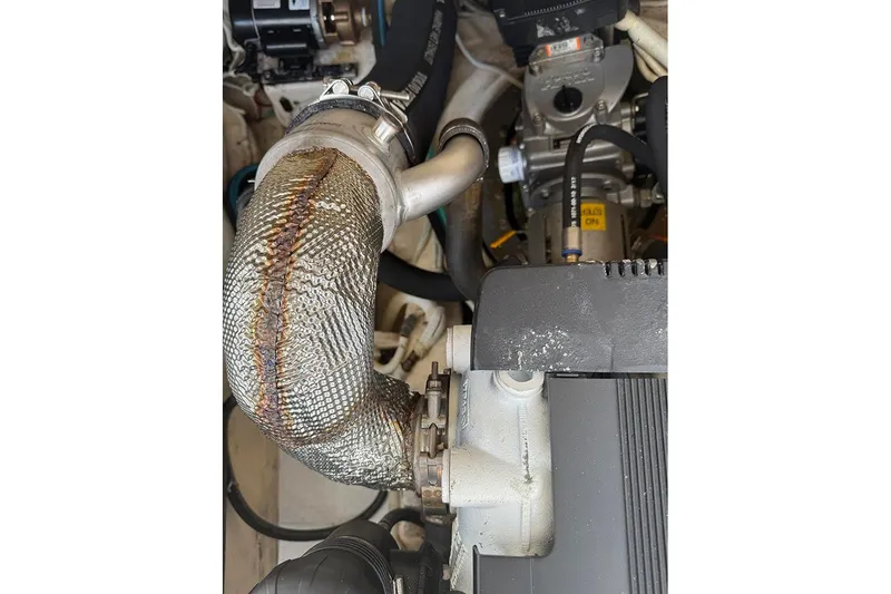 Slide: The Image of Engine compartment of 2008 Tiara Yachts 3900 Sovran, showing exhaust and components. - 37