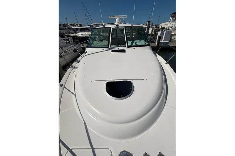 Slide: The Image of 2008 Tiara Yachts 3900 Sovran boat docked at marina, front deck view. - 45