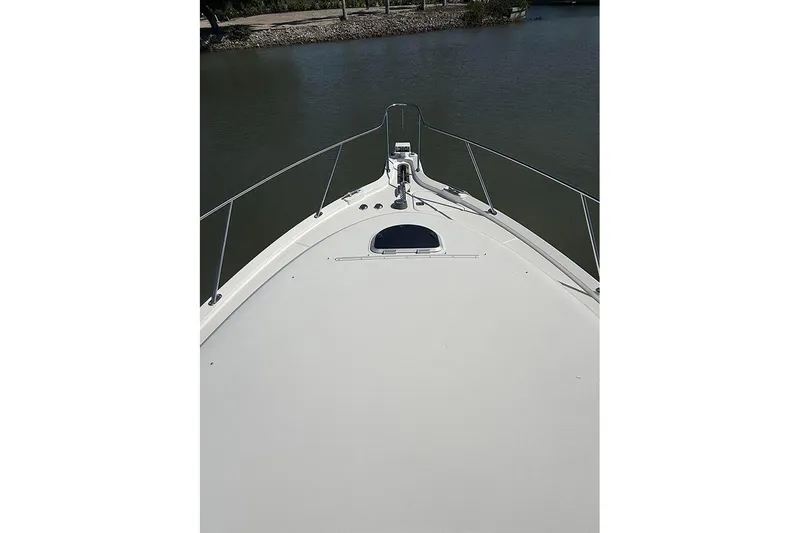 Slide: The Image of Bow view of 2008 Tiara Yachts 3900 Sovran on calm water. - 49
