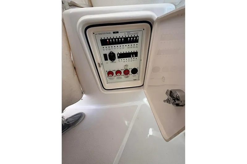 Slide: The Image of Electrical panel on 2008 Tiara Yachts 3900 Sovran, open compartment view. - 56