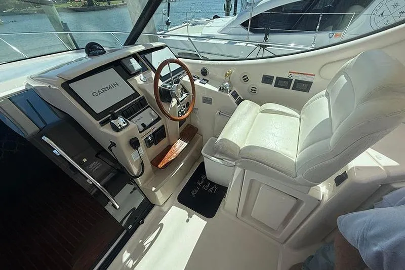 Slide: The Image of 2008 Tiara Yachts 3900 Sovran helm with Garmin navigation and luxurious seating. - 59