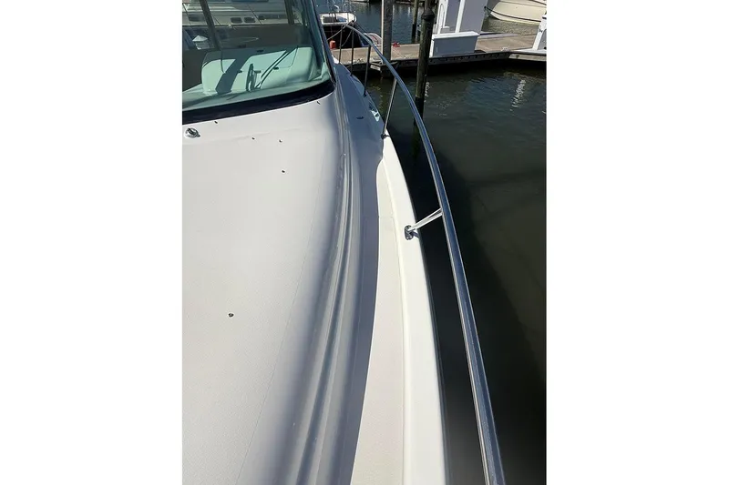 Slide: The Image of 2008 Tiara Yachts 3900 Sovran deck view at marina. - 6