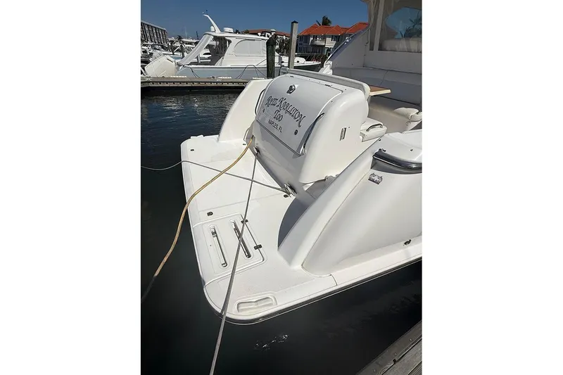 Slide: The Image of 2008 Tiara Yachts 3900 Sovran docked, showcasing sleek design and spacious deck. - 7