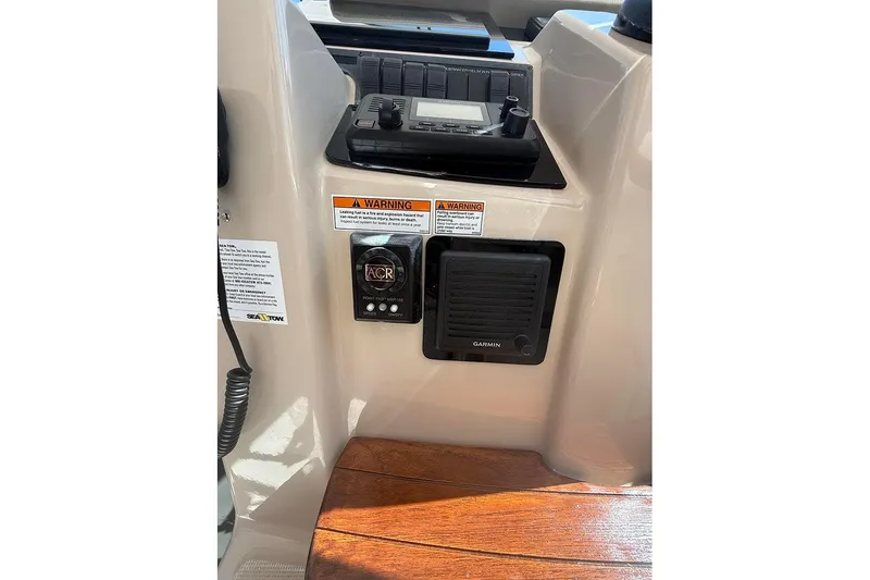 Slide: The Image of 2008 Tiara Yachts 3900 Sovran helm with Garmin and ACR controls. - 70