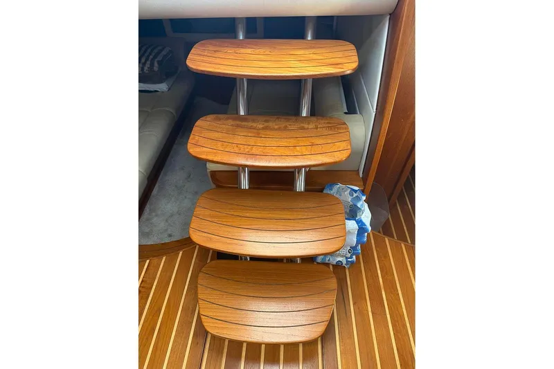 Slide: The Image of Wooden steps inside 2008 Tiara Yachts 3900 Sovran, showcasing elegant interior design. - 77