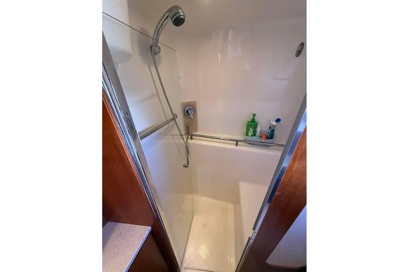 Slide: The Image of Shower area in 2008 Tiara Yachts 3900 Sovran, featuring modern fixtures and toiletries. - 80