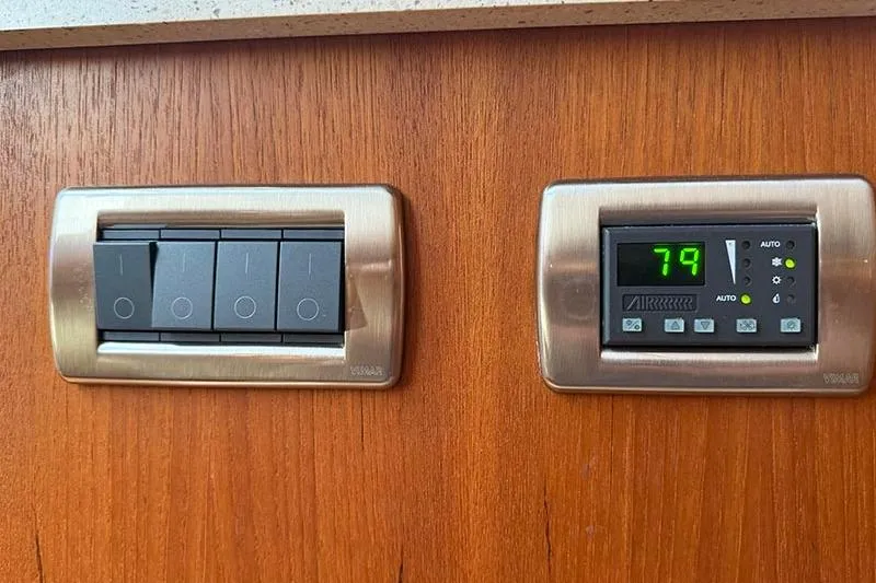 Slide: The Image of Control panel and switches on 2008 Tiara Yachts 3900 Sovran interior. - 89